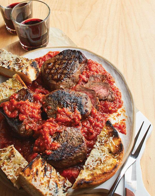 Grilled Steak Pizzaiola with Parmesan garlic bread