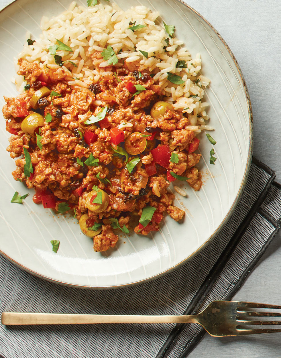 Pork Picadillo with rice and cilantro