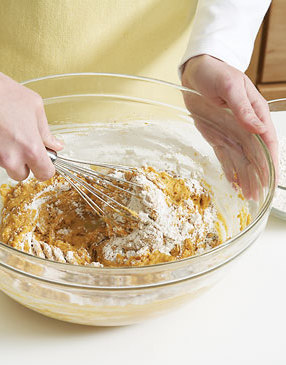 Fold the flour into the wet ingredients gradually with a whisk, the dough will be sticky. For easier handling, freeze dough for 15 minutes.