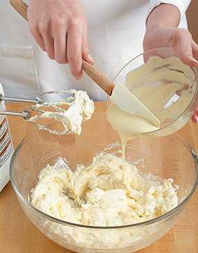So the frosting doesn't end up lumpy, completely combine cream cheese and butter before adding melted white chocolate.